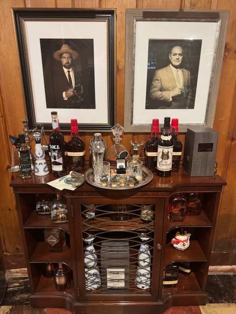 Bar cart and portraits
